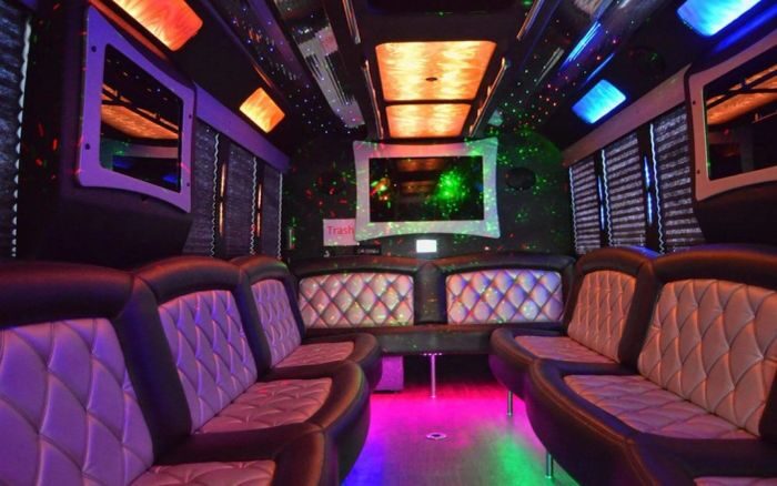 Party bus lounge with LED ceiling – Loveland limo service